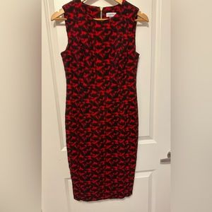 Calvin Klein size 8 red stretchy dress. Gold zipper. Hem is down but easy to fix